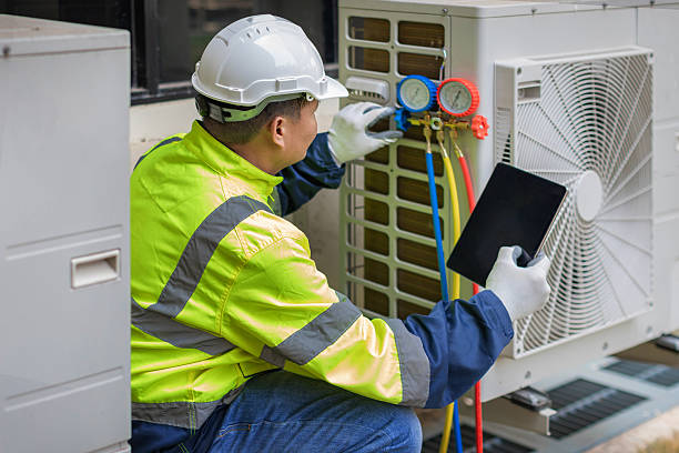 Professional Ac Installation technician working in Fayville, MA